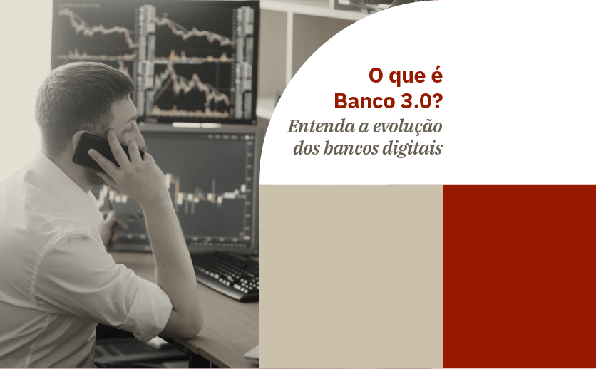 Operador do mercado financeiro fala no celular então trabalha em um computador. A imagem é a capa do texto que explica o que é Banco 3.0.